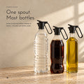 Carbon Pourer. Flip-lid spout and handle for most bottles at home