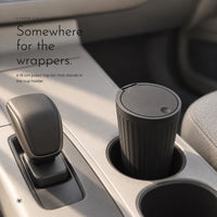 Carbon Car Bin. Small press-top bin that sits in your cup holder view 1