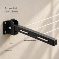 Carbon Clothesline. Wall arms that fold flat, 55 ft of nylon rope view 4