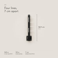 Carbon Clothesline. Wall arms that fold flat, 55 ft of nylon rope view 5