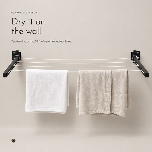 A linen towel and shirt drying on the clothesline