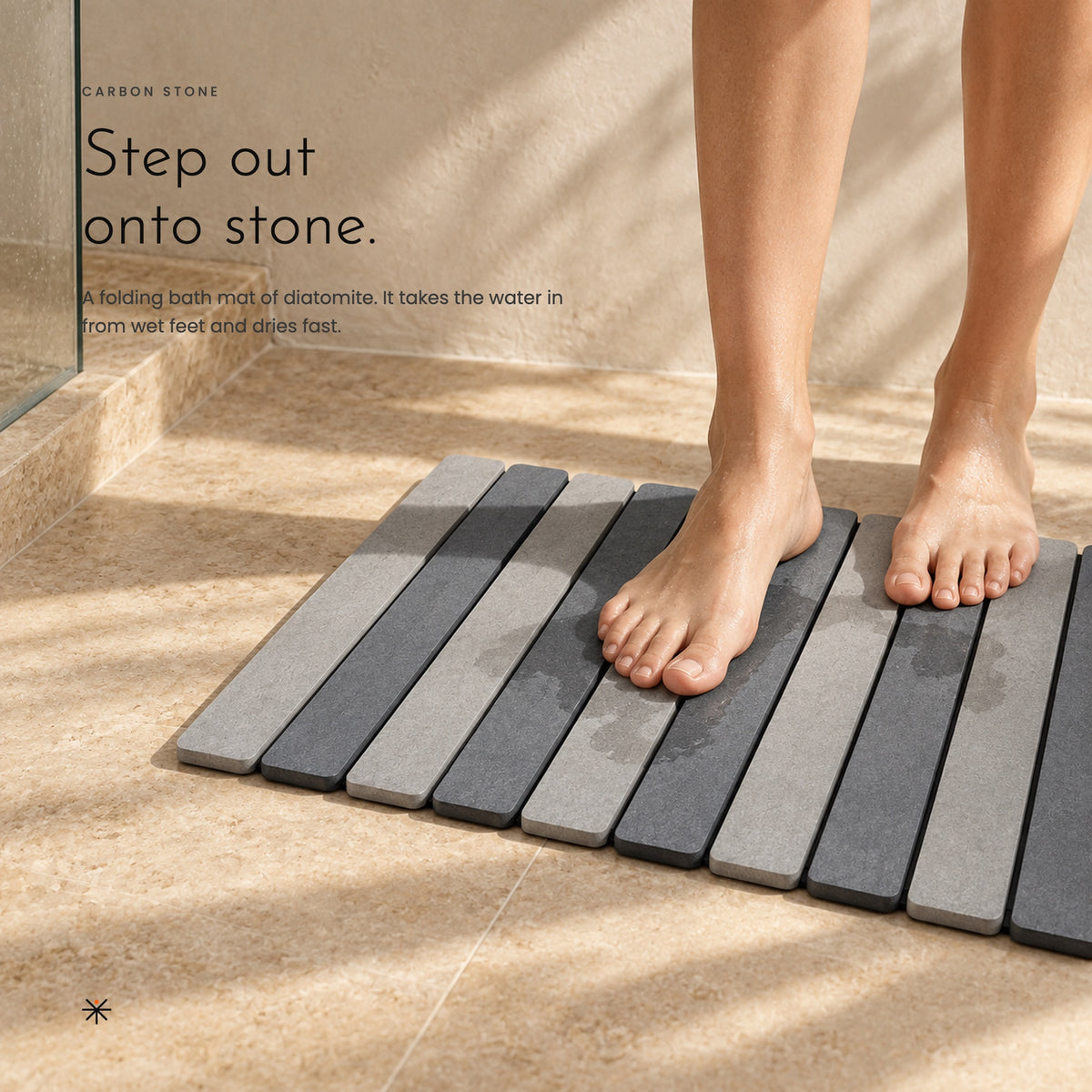 Carbon Stone. A folding diatomite bath mat that dries fast