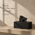 Carbon Tissues. Black, three-ply, in a box that says nothing